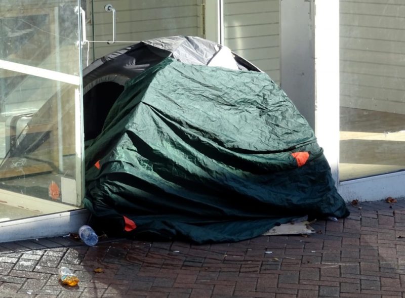 Homeless Tent In Shop Doorway.
