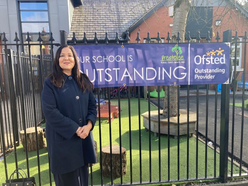 Yasmin stood outside a school in the constituency